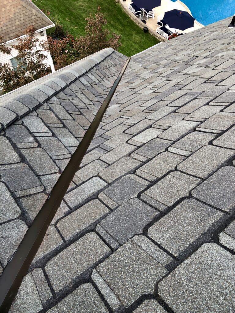 A close up of the roofing shingles of a house NJ Roof Installations
