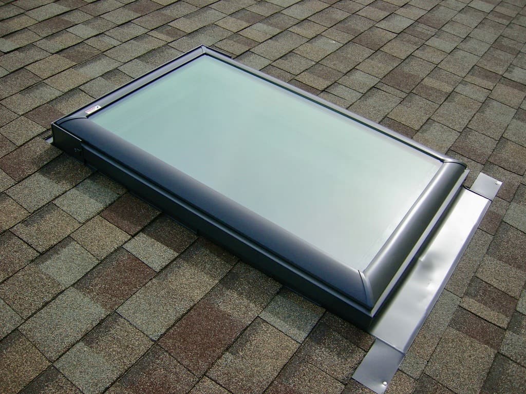 A large skylight on the roof of a house