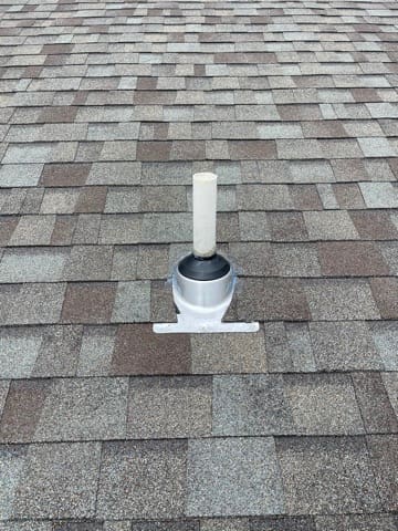 A roof with a vent on it