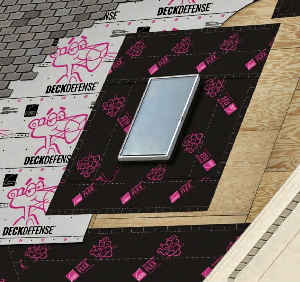 A close up of the roof with pink and black stickers