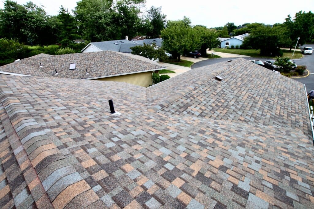 Large roof top with colorful roof shingles installed by new jersey roofing contractor